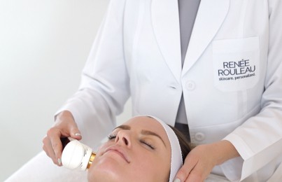 a woman getting skincare on her face by a Renee Rouleau specialist