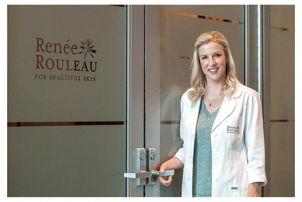Renee standing at the entrance of her clinic