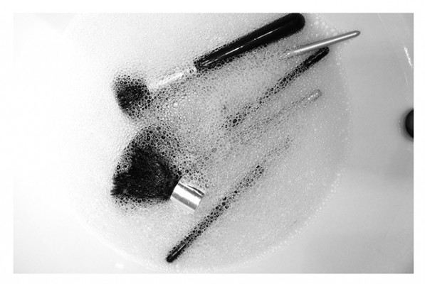 makeup brushes soaked in the sink