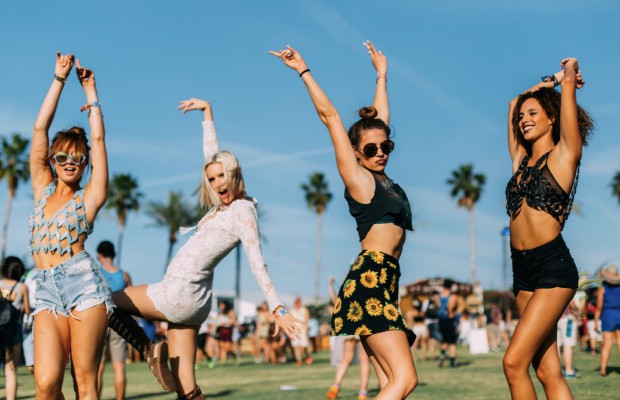 four women at a festival