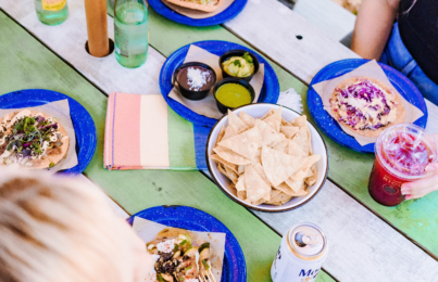 tacos and food on a table