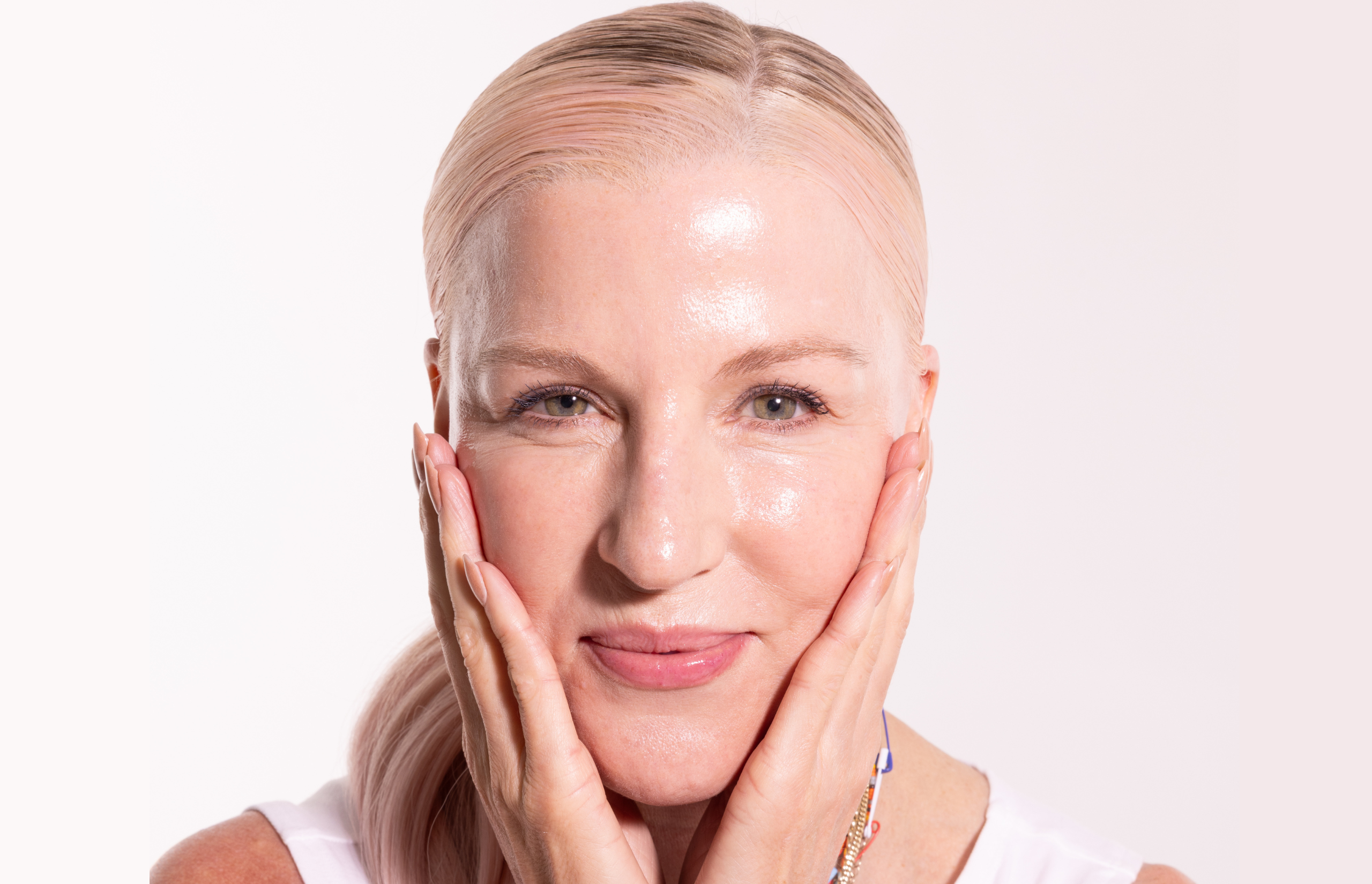 esthetician model touching face